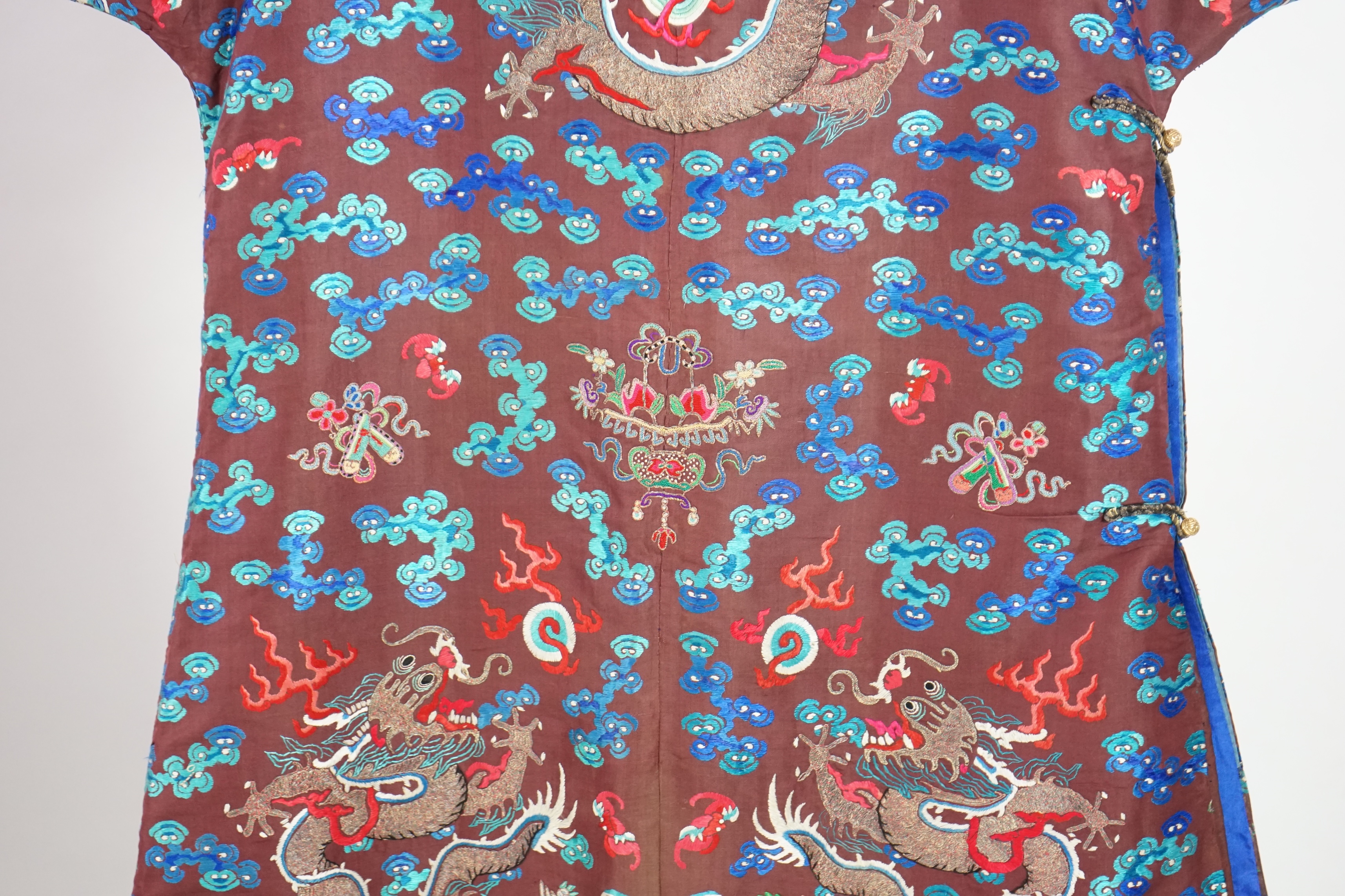 A Chinese brown silk court robe for an Imperial Duke, jifu, late 19th century